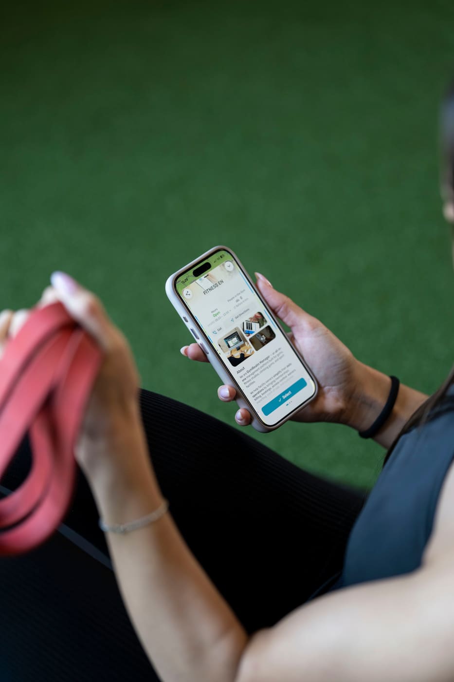 Member using the GymRealm branded gym mobile app