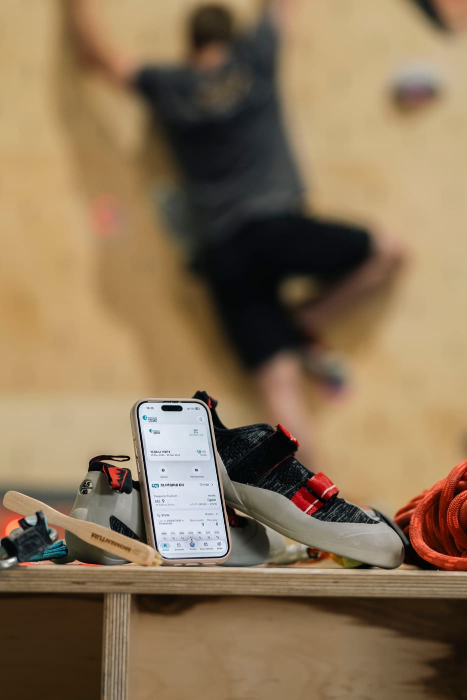 Member using the GymRealm branded gym mobile app